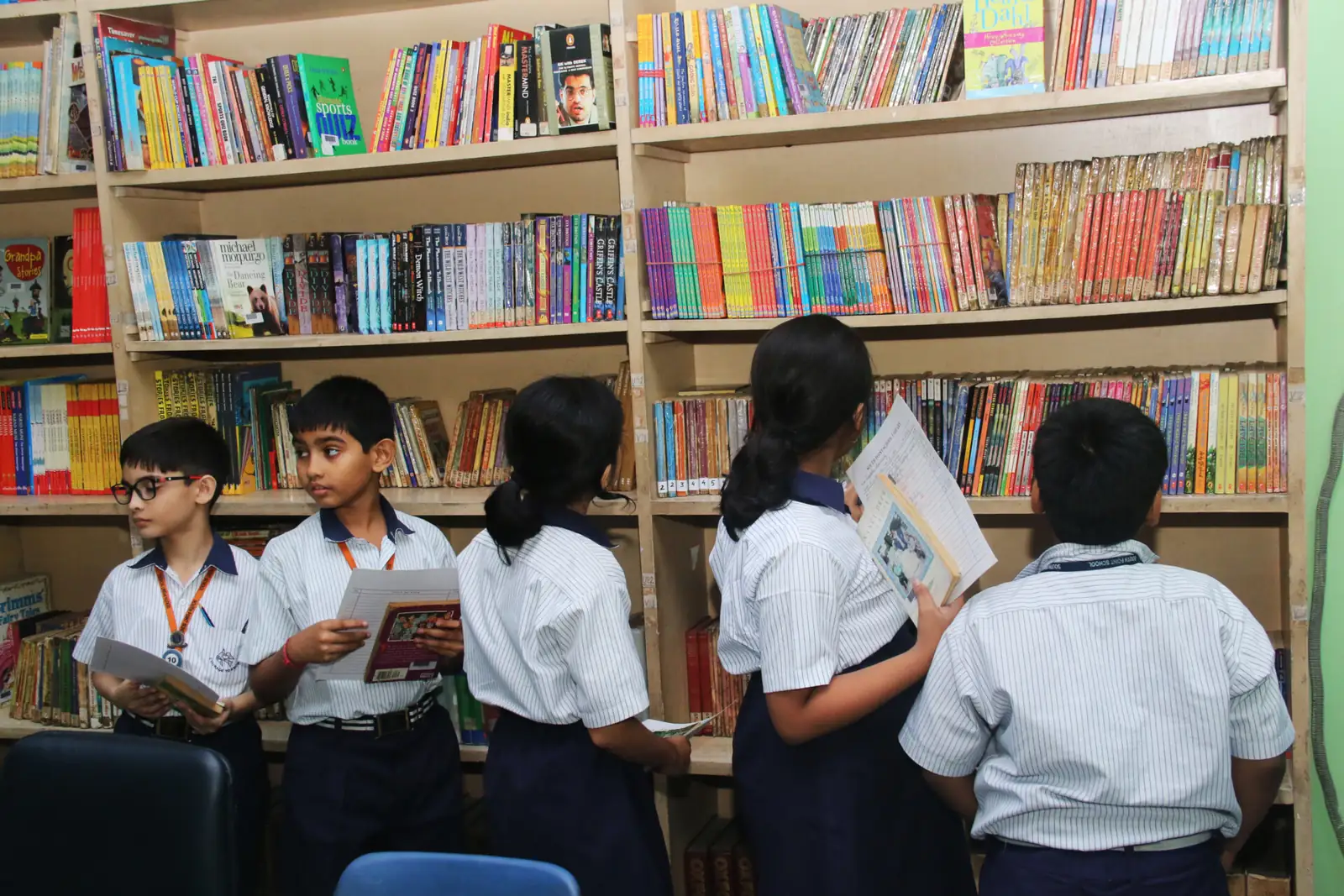 Students reading in the school library